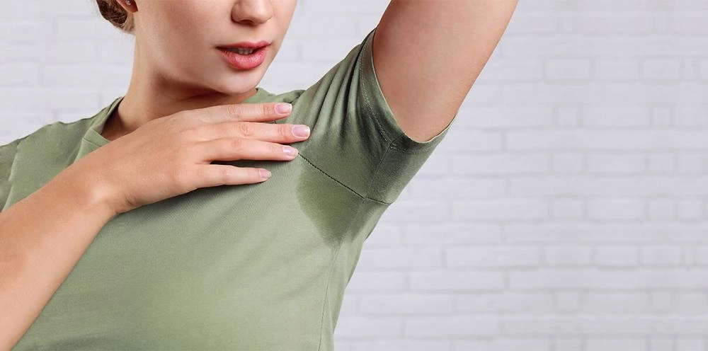 Sweating armpits from axillary hyperhidrosis before Hidroxa iontophoresis treatment
